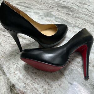 Christian Louboutin (red bottom shoes)